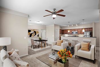 Living room with dining room and kitchen view